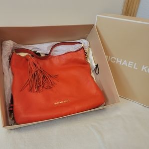 MICHAEL KORS ORANGE LEATHER TASSEL HANDBAG